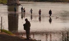 Migrants crossing the Rio Grande from Mexico to the United States near Eagle Pass, Texas.