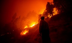 Castle Fire burns Near Ponderosa<br>epa08669814 A firefighter checks on the evolution of the Castle Fire as it burns in a slope next to the 190 highway in the Sequoia National Forest prompting evacuations, between Ponderosa and Camp Nelson, California, USA, 14 September 2020 (issued 15 September 2020). According to reports, the Castle Fire has burnt over 90,000 acres of forest. EPA/ETIENNE LAURENT