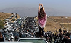 A demonstrator defies the crackdown last year on peaceful protests led by women in Iran