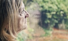 A woman looking out of a window