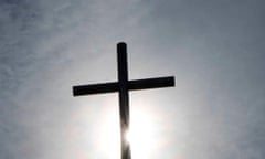 FILES-FRANCE-HEALTH-VIRUS-RELIGION<br>(FILES) In this file photo taken on March 4, 2020 in Mulhouse, shows the cross above the "Porte ouverte" evangelical church, where several persons have been contaminated by the new Covid-19 Coronavirus. - The Christian Open Door, a Protestant evangelical church founded in 1965 and affiliated to the National Council of Evangelicals of France (Cnef) opens its doors to worship on July 12, 2020, following the COVID-19 pandemic which brought most of the world into lockdown. According to the church website, Mulhouse and members of this church, is where the origin of one of the main outbreaks of the novel coronavirus broke out in February. (Photo by Sébastien BOZON / AFP) (Photo by SEBASTIEN BOZON/AFP via Getty Images)