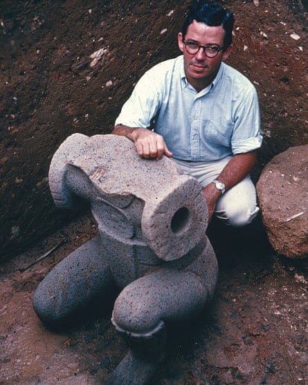 Michael Coe with one of his discoveries, a carving of a figure with removable arms, maybe representing an ancient ball player, at the Olmec city of San Lorenzo, Veracruz, Mexico, 1967.