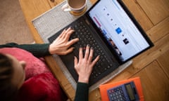 Woman at a computer.