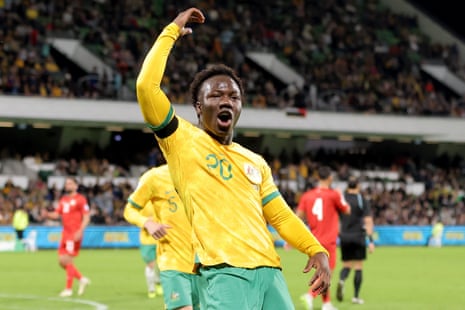 Nestory Irankunda celebrates after scoring his first international goal for the Socceroos