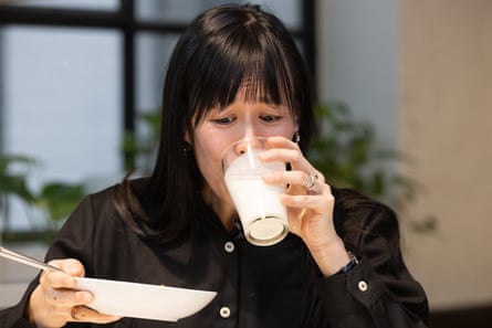 Yvonne Lam drinks a glass of milk at the taste test.