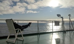 One of only two fellow passengers enjoying a sunny afternoon on board the cargo ship.