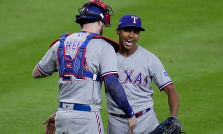 Texas Rangers relief pitcher Jose Leclerc is congratulated by catcher Jonah Heim