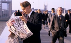 Man reading newspaper on London Bridge, Black Wednesday