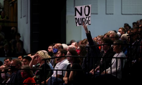 A ‘No purge’ sign held aloft during Keir Starmer’s speech.