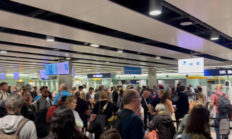 'Nothing ever works': UK passengers delayed at airport passport control after e-gates fail – video