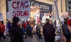 Adjunct professors and Columbia College Faculty Union members walk the picket line outside Columbia College Chicago.
