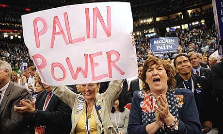 Delegates cheer as Sarah Palin takes the stage at the Republican National Convention in St Paul.
