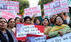 Members of the All India Women's Congress attend a protest in New Delhi to mark the increasing violence against women.