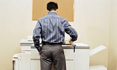 man using photocopying machine 