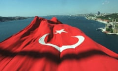 A huge Turkish flag waves from the Bosphorus bridge in Istanbul.