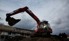 Digger on a social housing estate