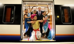 Mind the gap: Boris Johnson with Indian dancers at a London Overground opening event  in 2010.