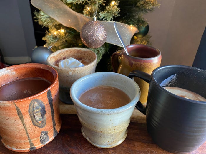 celebrity chef hot chocolates all in mugs on table