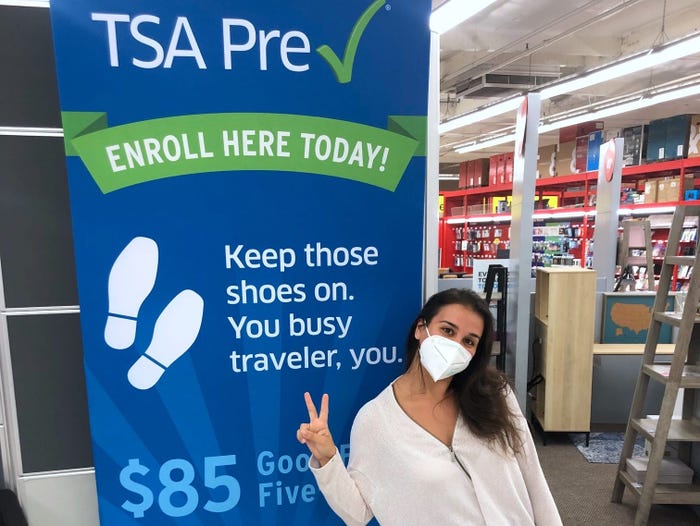 Anneta with TSA pre-check sign