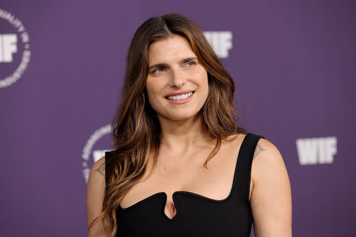 Lake Bell in a black dress