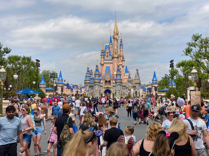 crowds in front of cinderella castle at magic kingdom