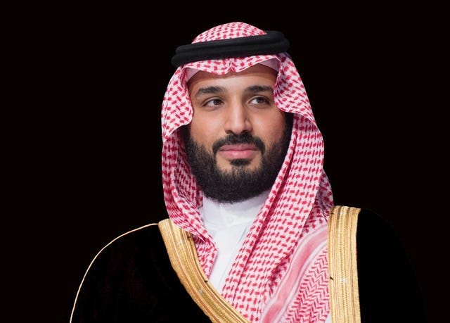 Prince Mohammed bin Salman in front of a black background.