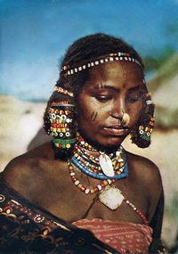 Africa | "Kunama Beauty, Eritrea". ca. 1970s | Vintage postcard; photograph by M Cittadini ||| Source; http://www.ebay.com/itm/a-vintage-post-card-kunama-beauty-eritrea-ethiopia-70s-E30-/231396697355