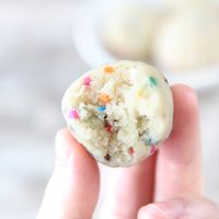 These birthday cake themed protein balls are packed with energy and a whole lot of happiness. Their subtle fruity sweetness comes from APPLESAUCE, which keeps these energy bites moist and soft!