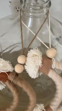 Beautiful handmade neutral macrame moons with wood beads on cotton or jute. Perfect touch to any nursery, kids room or any other room of your home! Great gift for a baby shower or birthday!