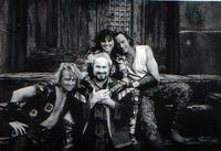 Iolaus (Michael Hurst), Salmoneus (Robert Trebor), Xena (Lucy Lawless), and Hercules (Kevin Sorbo) in costume for Hercules: The Legendary Journeys.