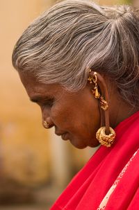 India | Hindu Woman With Several Earrings And Rings Hung At Her Ears.  Madurai | © Eric Lafforgue