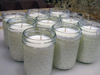 Make your own 50-hour candles for less than 2 dollars a piece.  you can even add scents and color.  All natural soy.