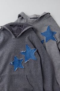 Remade star patch hoodie sweatshirt by Urban Renewal. Pullover sweatshirt topped with star patch accents. This modern design was created by Urban Renewal from unique vintage and deadstock items found around the world. Though similar in style to what you see here, each upcycled item is one-of-a-kind and may vary from piece to piece. Features Updated vintage star patch hoodie sweatshirt from Urban Renewal Urban Renewal Remade features upcycled pieces reimagined by our Urban Renewal team Updated by hand in the US, so no two are exactly alike You will receive a completely unique piece that will vary from the item pictured here Content + Care Cotton, polyester Machine wash Made in the USA Size + Fit Model is 5'9" and wearing size S/M Measurements taken from size S/M Chest: 44" Length: 26" | Urb