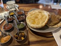 Bread service.  Sauces proceed from mild to spicy - Yelp