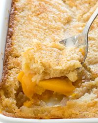 This easy Peach Cobbler recipe is perfect to make in the summer with juicy, ripe peaches or throughout the year with frozen or canned peaches.