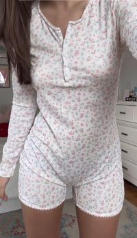 Experience relaxation and style with our Blossom Floral Cotton Pajama Bodysuit. Crafted from 100% cotton, this cozy bodysuit offers the perfect blend of softness and breathability, ensuring a restful night's sleep or lounging in comfort. The exquisite blossom floral pattern adds a touch of elegance, while the stretchy design and convenient snaps make it easy to wear. Upgrade your bedtime routine with this chic and comfortable Blossom Floral Cotton Pajama Bodysuit, perfect for lazy days and laid-