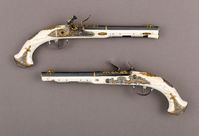 Pair of Flintlock Pistols of Empress Catherine the Great (1729–1796); Johan Adolph Grecke; 1786; Russian, Saint Petersburg; Steel, ivory, gold, brass; Firearms-Pistols-Flintlock; Gift of John M. Schiff, in memory of Edith Baker Schiff, 1986; (1986.265.1, .2); Firearms