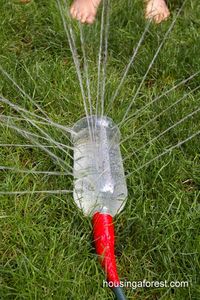 Make your own sprinkler for this summer. Use duck tape to attach to hose and just stab holes into a 2 liter bottle. {makes so much more sense than those cheap sprinklers that break after a week's use!}