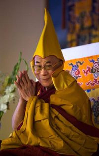 HH Dalai Lama in traditional lineage teachers' robe and cap of Gelugpa Tibetan Buddhist sect