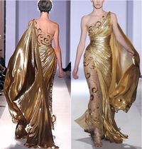 Couldn't find one picture with front and back, so I downloaded/squished them together. The qualities don't match, but still! It's so shiny. Zuhair Murad.