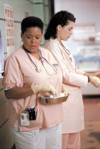 Julianna Margulies and Yvette Freeman starring on ER as nurses Carol Hathaway and Haleh Adams. The character of Hathaway was written out in season 6 and Adams was in every season at some point.