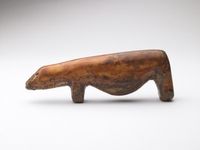 Punuk or Thule Pregnant polar bear, A.D. 800–1850 Walrus ivory h. 4.2 cm., l. 12.5 cm., d. 2 cm. (1 5/8 x 4 15/16 x 13/16 in.) The Lloyd E. Cotsen, Class of 1950, Eskimo Bone and Ivory Carving Collection 1997-173