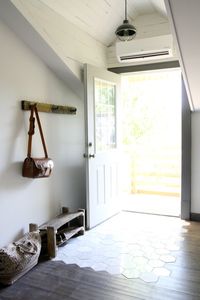 A modern day mil suite, via house*tweaking. I like the part tile entry flooring in that foyer space.