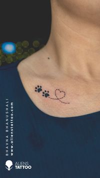 "Until one has loved an animal a part of one's soul remains unawakened." Want to dedicate a tattoo to your pet but can't find the right tattoo studio to make your love tangible? Checkout This Minimal Paw Tattoo For Women on collar bone done by Bhavna Bhanushali at Aliens Tattoo India. If You wish to get this minimal tattoos visit https://www.alienstattoo.com/best-small-tattoo-ideas #Smalltattoo #Minimaltattoo #Pawtattoo #Pettattoo #Alienstattoo #Alienstattooindia.