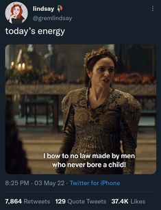 a tweet with an image of a woman talking to someone