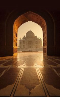 an archway leading to the tajwa mosque in india