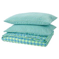 three pillows stacked on top of each other in blue and green gingham fabric