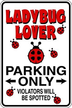 ladybug lover parking only sign is shown