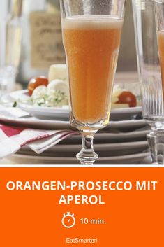 an orange - proseco mit is served in two tall glasses