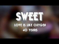 the words sweet love is like oxygen 40 years ago on a blurry photo background